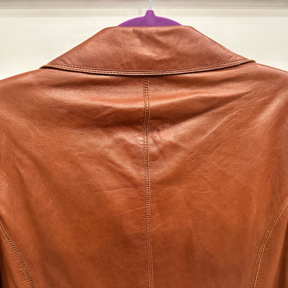 St John, slightly used soft leather biker style jacket with gold hardware.